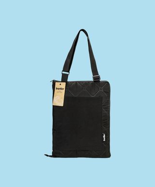 Frontier Fraser picnic blanket folded into its black carry bag.