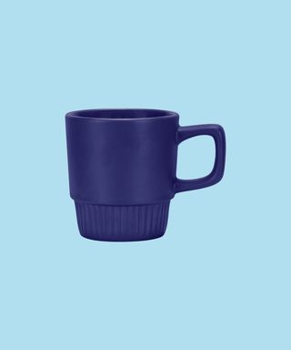 Royal Blue Barista Stackable Coffee Mug on a light blue background.
