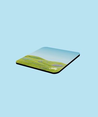 Rectangular custom mouse pad with the approved sample design.